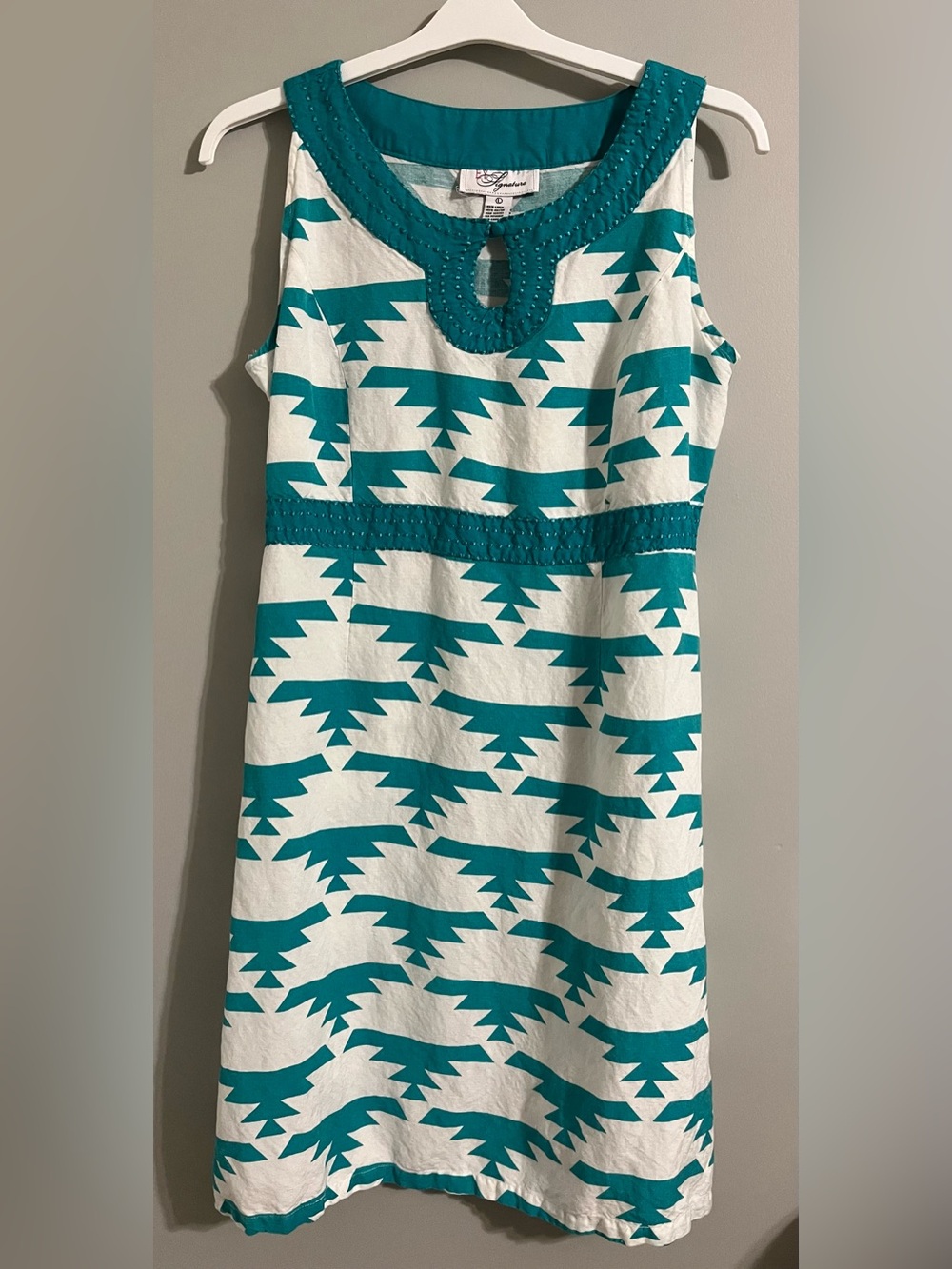 EY Signature Sleeveless Sheath Dress